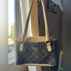 Brown and tan shoulder bag